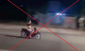 Phạt thanh niên bỏ 2 tay khi đi xe máy, không đội mũ bảo hiểm