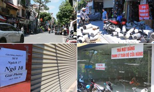 Hàng loạt cửa hàng trên đường Giải Phóng trả mặt bằng