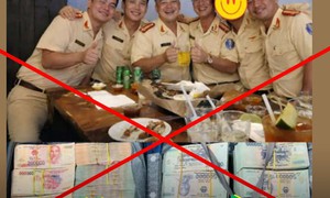 Công an khẳng định hình ảnh CSGT 'ăn mừng' bên những cọc tiền là giả mạo, cắt ghép