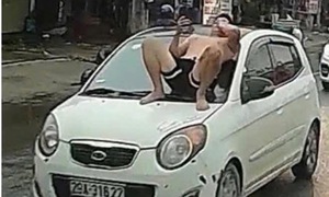 Bố vợ đòi lại xe ô tô, con rể nằm 'ăn vạ' trên nắp capo, hai bố con bị khởi tố