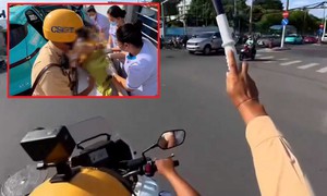 Đang mở đường cho sản phụ thì em bé chào đời trên taxi, CSGT đổi hướng trong tích tắc cứu hai mẹ con