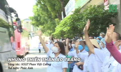 &#39;Những thi&#234;n thần &#225;o trắng&#39;, khi nh&#224; b&#225;o l&#224;m ca sĩ cổ vũ ng&#224;nh Y m&#249;a COVID-19