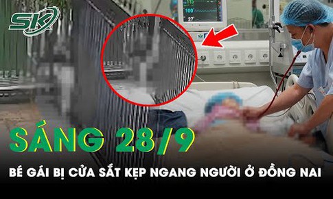 B&#233; g&#225;i sinh năm 2019 h&#244;n m&#234; sau khi bị cửa sắt tự động kẹp ngang người ở Đồng Nai