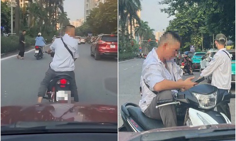 X&#244;n xao clip người đ&#224;n &#244;ng ngang nhi&#234;n chặn đường, đ&#242;i tiền đỗ xe ở H&#224; Nội