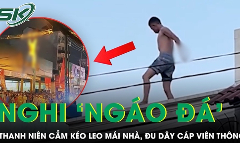 Thanh niên nghi ‘ngáo đá’ cầm kéo leo mái nhà, đu dây cáp viễn thông khiến cả khu phố náo loạn