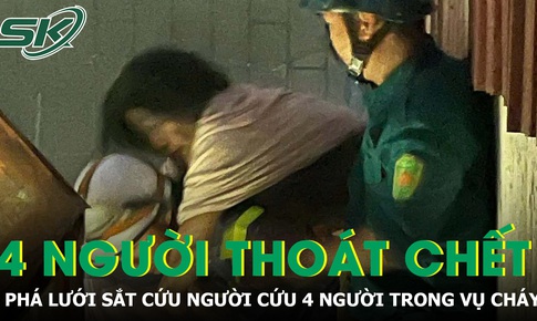 Phá lưới sắt, giải cứu 4 người mắc kẹt trong vụ cháy lúc rạng sáng ở Hà Nội