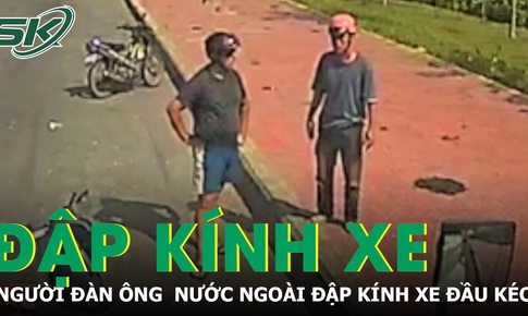 Bức xúc vì cho rằng bị ép xe, người đàn ông nước ngoài đập kính xe đầu kéo