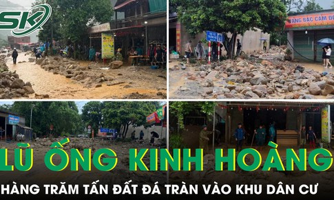 Lũ ống cuốn theo hàng trăm tấn đất đá tràn vào khu dân cư ở Lào Cai
